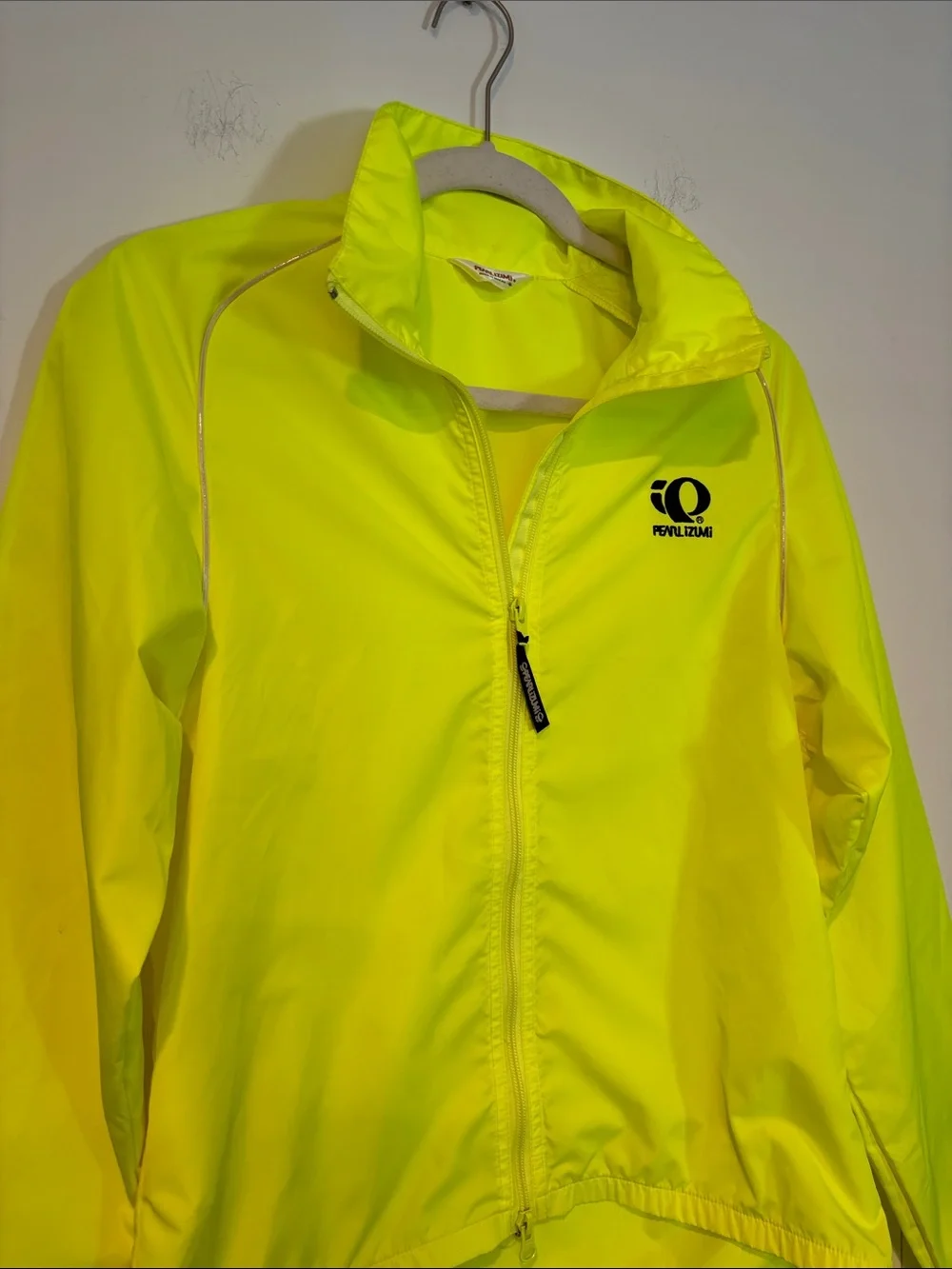 Pearl Izumi Women’s Zephrr Cycling Jacket in Neon Yellow in a Size Medium